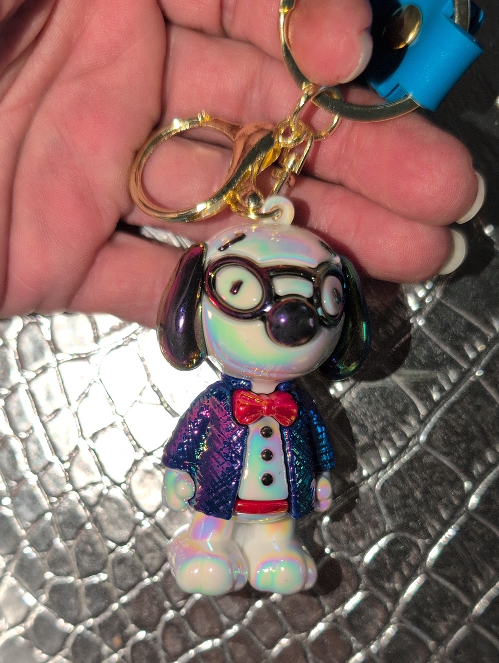 Iridescent Snoopy Dog Keychain Charm with Blue Jacket and Red Bow And Glasses